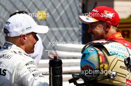 (L to R): Valtteri Bottas (FIN) Mercedes AMG F1 and Sebastian Vettel (GER) Ferrari in qualifying parc ferme. 27.05.2017. Formula 1 World Championship, Rd 6, Monaco Grand Prix, Monte Carlo, Monaco, Qualifying Day.