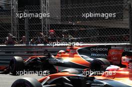 Stoffel Vandoorne (BEL) McLaren MCL32 crashes during qualifying and is passed by team mate Jenson Button (GBR) McLaren MCL32. 27.05.2017. Formula 1 World Championship, Rd 6, Monaco Grand Prix, Monte Carlo, Monaco, Qualifying Day.
