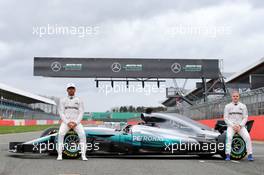 (L to R): Lewis Hamilton (GBR) Mercedes AMG F1 and Valtteri Bottas (FIN) Mercedes AMG F1 with the Mercedes AMG F1 W08. 23.02.2017. Mercedes AMG F1 W08 Launch, Silverstone, England.