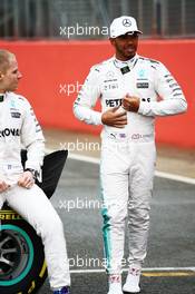 (L to R): Valtteri Bottas (FIN) Mercedes AMG F1 with Lewis Hamilton (GBR) Mercedes AMG F1. 23.02.2017. Mercedes AMG F1 W08 Launch, Silverstone, England.