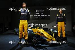 (L to R): Jolyon Palmer (GBR) Renault Sport F1 Team with team mate Nico Hulkenberg (GER) Renault Sport F1 Team and the Renault Sport F1 Team RS17. 21.02.2017. Renault Sport Formula One Team RS17 Launch, Royal Horticultural Society Headquarters, London, England.