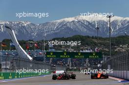 (L to R): Romain Grosjean (FRA) Haas F1 Team VF-17 and Fernando Alonso (ESP) McLaren MCL32. 28.04.2017. Formula 1 World Championship, Rd 4, Russian Grand Prix, Sochi Autodrom, Sochi, Russia, Practice Day.