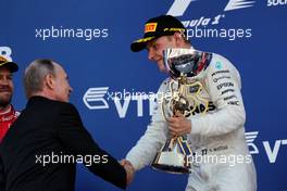 Race winner Valtteri Bottas (FIN) Mercedes AMG F1 with Vladimir Putin (RUS) Russian Federation President on the podium. 30.04.2017. Formula 1 World Championship, Rd 4, Russian Grand Prix, Sochi Autodrom, Sochi, Russia, Race Day.