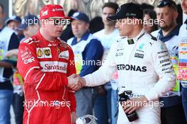 Kimi Raikkonen (FIN) Ferrari SF70H and Valtteri Bottas (FIN) Mercedes AMG F1 W08. 29.04.2017. Formula 1 World Championship, Rd 4, Russian Grand Prix, Sochi Autodrom, Sochi, Russia, Qualifying Day.