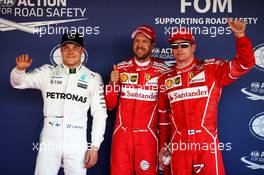 Qualifying top three in parc ferme (L to R): Valtteri Bottas (FIN) Mercedes AMG F1, third; Sebastian Vettel (GER) Ferrari, pole position; Kimi Raikkonen (FIN) Ferrari, second. 29.04.2017. Formula 1 World Championship, Rd 4, Russian Grand Prix, Sochi Autodrom, Sochi, Russia, Qualifying Day.