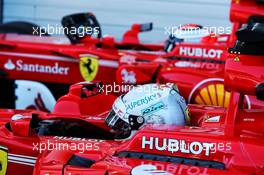 Pole sitter Sebastian Vettel (GER) Ferrari SF70H and team mate Kimi Raikkonen (FIN) Ferrari SF70H in qualifying parc ferme. 29.04.2017. Formula 1 World Championship, Rd 4, Russian Grand Prix, Sochi Autodrom, Sochi, Russia, Qualifying Day.