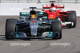 Lewis Hamilton (GBR) Mercedes AMG F1  and Sebastian Vettel (GER) Scuderia Ferrari  29.04.2017. Formula 1 World Championship, Rd 4, Russian Grand Prix, Sochi Autodrom, Sochi, Russia, Qualifying Day.