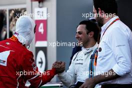 (L to R): Sebastian Vettel (GER) Ferrari celebrates his pole position with Felipe Massa (BRA) Williams in qualifying parc ferme. 29.04.2017. Formula 1 World Championship, Rd 4, Russian Grand Prix, Sochi Autodrom, Sochi, Russia, Qualifying Day.