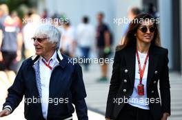 (L to R): Bernie Ecclestone (GBR) with his wife Fabiana Flosi (BRA). 30.04.2017. Formula 1 World Championship, Rd 4, Russian Grand Prix, Sochi Autodrom, Sochi, Russia, Race Day.