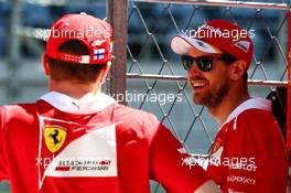 (L to R): Kimi Raikkonen (FIN) Ferrari with team mate Sebastian Vettel (GER) Ferrari. 27.04.2017. Formula 1 World Championship, Rd 4, Russian Grand Prix, Sochi Autodrom, Sochi, Russia, Preparation Day.
