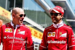 Sebastian Vettel (GER) Ferrari walks the circuit with Jock Clear (GBR) Ferrari Engineering Director. 27.04.2017. Formula 1 World Championship, Rd 4, Russian Grand Prix, Sochi Autodrom, Sochi, Russia, Preparation Day.