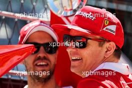 (L to R): Sebastian Vettel (GER) Ferrari with Kimi Raikkonen (FIN) Ferrari. 27.04.2017. Formula 1 World Championship, Rd 4, Russian Grand Prix, Sochi Autodrom, Sochi, Russia, Preparation Day.