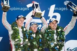 Race winners Brendon Hartley (NZL), Earl Bamber (NZL), Timo Bernhard (GER) #02 Porsche LMP Team, Porsche 919 Hybrid, celebrate on the podium. 14.06.2017-18.06.2016 Le Mans 24 Hour Race 2017, Le Mans, France