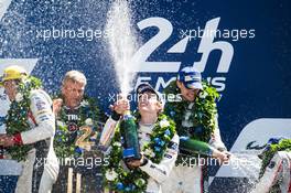 Race winners Brendon Hartley (NZL), Earl Bamber (NZL), Timo Bernhard (GER) #02 Porsche LMP Team, Porsche 919 Hybrid, celebrate on the podium. 14.06.2017-18.06.2016 Le Mans 24 Hour Race 2017, Le Mans, France
