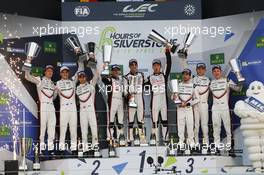 The podium (L to R): Brendon Hartley (NZL); Earl Bamber (NZL); Timo Bernhard (GER) #02 Porsche LMP Team, Porsche 919 Hybrid; second; Anthony Davidson (GBR); Sebastien Buemi (SUI); Kamui Kobayashi (JPN) #08 Toyota Gazoo Racing Toyota TS050 Hybrid, race winners; Neel Jani (SUI); Andre Lotterer (GER); Nick Tandy (GBR) #01 Porsche LMP Team, Porsche 919 Hybrid, third. 16.04.2017. FIA World Endurance Championship, Round 1, Silverstone, England, Sunday.