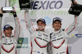 (L to R): Race winners Timo Bernhard (GER); Earl Bamber (NZL); and Brendon Hartley (NZL) #02 Porsche LMP Team, Porsche 919 Hybrid, celebrate on the podium. 03.09.2017. FIA World Endurance Championship, Rd 5, 6 Hours of Mexico, Mexico City, Mexico.