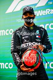 Race winner Lewis Hamilton (GBR) Mercedes AMG F1 with the helmet of Michael Schumacher (GER) by Mick Schumacher (GER) in parc ferme after equalling the record for the number of F1 victories. 11.10.2020. Formula 1 World Championship, Rd 11, Eifel Grand Prix, Nurbugring, Germany, Race Day.