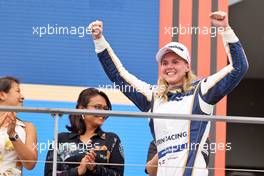 Race winner Beitske Visser (NED) Sirin Racing W Series Team celebrates on the podium. 02.10.2022. W Series, Rd 6, Marina Bay Street Circuit, Singapore, Race Day.