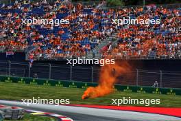 An orange flare lands near the track. 30.06.2023. Formula 1 World Championship, Rd 10, Austrian Grand Prix, Spielberg, Austria, Qualifying Day.