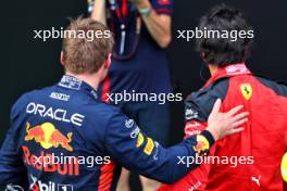 (L to R): Max Verstappen (NLD) Red Bull Racing with Carlos Sainz Jr (ESP) Ferrari in qualifying parc ferme. 30.06.2023. Formula 1 World Championship, Rd 10, Austrian Grand Prix, Spielberg, Austria, Qualifying Day.
