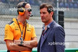 (L to R): Tom Stallard (GBR) McLaren Race Engineer with Mark Webber (AUS) Channel 4 Presenter on the grid. 02.07.2023. Formula 1 World Championship, Rd 10, Austrian Grand Prix, Spielberg, Austria, Race Day.