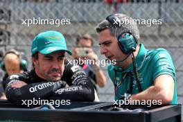 Fernando Alonso (ESP) Aston Martin F1 Team with Chris Cronin (GBR) Aston Martin F1 Team Race Engineer on the grid. 02.07.2023. Formula 1 World Championship, Rd 10, Austrian Grand Prix, Spielberg, Austria, Race Day.