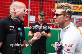 (L to R): Gary Gannon (GBR) Haas F1 Team Race Engineer with Nico Hulkenberg (GER) Haas F1 Team on the grid. 02.07.2023. Formula 1 World Championship, Rd 10, Austrian Grand Prix, Spielberg, Austria, Race Day.