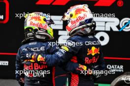 (L to R): Third placed Sergio Perez (MEX) Red Bull Racing celebrates with race winner and team mate Max Verstappen (NLD) Red Bull Racing. 02.07.2023. Formula 1 World Championship, Rd 10, Austrian Grand Prix, Spielberg, Austria, Race Day.