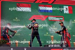 Race winner Max Verstappen (NLD) Red Bull Racing celebrates on the podium with Phil Turner (GBR) Red Bull Racing Chief Mechanic and team mate Sergio Perez (MEX) Red Bull Racing. 02.07.2023. Formula 1 World Championship, Rd 10, Austrian Grand Prix, Spielberg, Austria, Race Day.