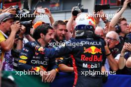 Race winner Max Verstappen (NLD) Red Bull Racing celebrates with the team in parc ferme. 02.07.2023. Formula 1 World Championship, Rd 10, Austrian Grand Prix, Spielberg, Austria, Race Day.