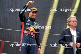 Sergio Perez (MEX) Red Bull Racing celebrates his third position on the podium. 02.07.2023. Formula 1 World Championship, Rd 10, Austrian Grand Prix, Spielberg, Austria, Race Day.