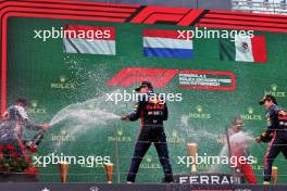 Race winner Max Verstappen (NLD) Red Bull Racing celebrates on the podium with Phil Turner (GBR) Red Bull Racing Chief Mechanic. 02.07.2023. Formula 1 World Championship, Rd 10, Austrian Grand Prix, Spielberg, Austria, Race Day.