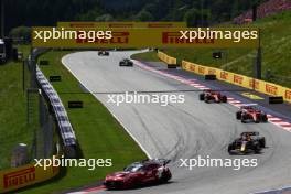 Max Verstappen (NLD) Red Bull Racing RB19 leads behind the Mercedes AMG FIA Safety Car. 02.07.2023. Formula 1 World Championship, Rd 10, Austrian Grand Prix, Spielberg, Austria, Race Day.