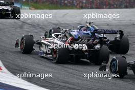 Alexander Albon (THA) Williams Racing FW45 and Kevin Magnussen (DEN) Haas VF-23 battle for position. 02.07.2023. Formula 1 World Championship, Rd 10, Austrian Grand Prix, Spielberg, Austria, Race Day.