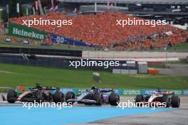 (L to R): Valtteri Bottas (FIN) Alfa Romeo F1 Team C43, Pierre Gasly (FRA) Alpine F1 Team A523, and Kevin Magnussen (DEN) Haas VF-23 nfp. 02.07.2023. Formula 1 World Championship, Rd 10, Austrian Grand Prix, Spielberg, Austria, Race Day.