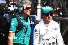 Fernando Alonso (ESP) Aston Martin F1 Team on the grid with Edoardo Bendinelli (ITA) Aston Martin F1 Team Personal Trainer. 30.04.2023. Formula 1 World Championship, Rd 4, Azerbaijan Grand Prix, Baku Street Circuit, Azerbaijan, Race Day.
