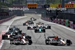 (L to R): Charles Leclerc (MON) Ferrari SF-23 and Sergio Perez (MEX) Red Bull Racing RB19 battle for the lead of the race. 30.04.2023. Formula 1 World Championship, Rd 4, Azerbaijan Grand Prix, Baku Street Circuit, Azerbaijan, Race Day.