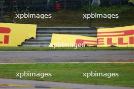 Damaged Pirelli branding against the armco. 28.07.2023. Formula 1 World Championship, Rd 13, Belgian Grand Prix, Spa Francorchamps, Belgium, Qualifying Day.