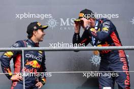 Sergio Perez (MEX) Red Bull Racing and Max Verstappen (NLD) Red Bull Racing. 30.07.2023. Formula 1 World Championship, Rd 13, Belgian Grand Prix, Spa Francorchamps, Belgium, Race Day.