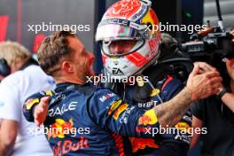 Race winner Max Verstappen (NLD) Red Bull Racing celebrates in parc ferme with Greg Reeson (GBR) Red Bull Racing Tyre Technician. 30.07.2023. Formula 1 World Championship, Rd 13, Belgian Grand Prix, Spa Francorchamps, Belgium, Race Day.