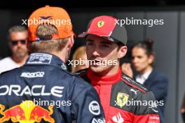 Charles Leclerc (MON) Ferrari with Max Verstappen (NLD) Red Bull Racing in parc ferme. 30.07.2023. Formula 1 World Championship, Rd 13, Belgian Grand Prix, Spa Francorchamps, Belgium, Race Day.