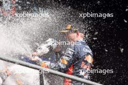 Race winner Max Verstappen (NLD) Red Bull Racing celebrates on the podium. 30.07.2023. Formula 1 World Championship, Rd 13, Belgian Grand Prix, Spa Francorchamps, Belgium, Race Day.
