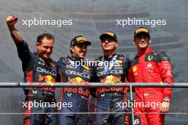 The podium (L to R): Greg Reeson (GBR) Red Bull Racing Tyre Technician; Sergio Perez (MEX) Red Bull Racing, second; Max Verstappen (NLD) Red Bull Racing, race winner; Charles Leclerc (MON) Ferrari, third. 30.07.2023. Formula 1 World Championship, Rd 13, Belgian Grand Prix, Spa Francorchamps, Belgium, Race Day.