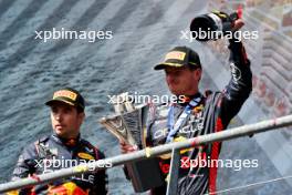 Race winner Max Verstappen (NLD) Red Bull Racing celebrates on the podium with team mate Sergio Perez (MEX) Red Bull Racing. 30.07.2023. Formula 1 World Championship, Rd 13, Belgian Grand Prix, Spa Francorchamps, Belgium, Race Day.
