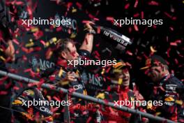 Greg Reeson (GBR) Red Bull Racing Tyre Technician celebrates on the podium. 30.07.2023. Formula 1 World Championship, Rd 13, Belgian Grand Prix, Spa Francorchamps, Belgium, Race Day.
