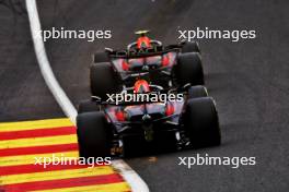 Sergio Perez (MEX) Red Bull Racing RB19 leads team mate Max Verstappen (NLD) Red Bull Racing RB19. 30.07.2023. Formula 1 World Championship, Rd 13, Belgian Grand Prix, Spa Francorchamps, Belgium, Race Day.