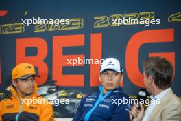 (L to R): Lando Norris (GBR) McLaren; Alexander Albon (THA) Williams Racing; and Tom Clarkson (GBR) Journalist in the FIA Press Conference. 27.07.2023. Formula 1 World Championship, Rd 13, Belgian Grand Prix, Spa Francorchamps, Belgium, Preparation Day.