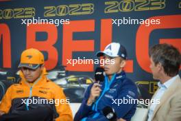 (L to R): Lando Norris (GBR) McLaren; Alexander Albon (THA) Williams Racing; and Tom Clarkson (GBR) Journalist in the FIA Press Conference. 27.07.2023. Formula 1 World Championship, Rd 13, Belgian Grand Prix, Spa Francorchamps, Belgium, Preparation Day.