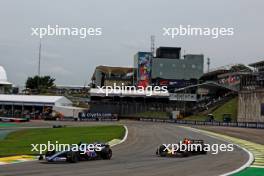 Esteban Ocon (FRA) Alpine F1 Team A523 and Max Verstappen (NLD) Red Bull Racing RB19. 03.11.2023. Formula 1 World Championship, Rd 21, Brazilian Grand Prix, Sao Paulo, Brazil, Qualifying Day.