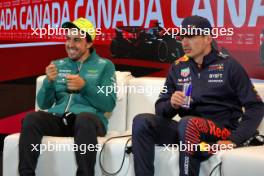 (L to R): Fernando Alonso (ESP) Aston Martin F1 Team and Max Verstappen (NLD) Red Bull Racing in the post race FIA Press Conference. 18.06.2023. Formula 1 World Championship, Rd 9, Canadian Grand Prix, Montreal, Canada, Race Day.